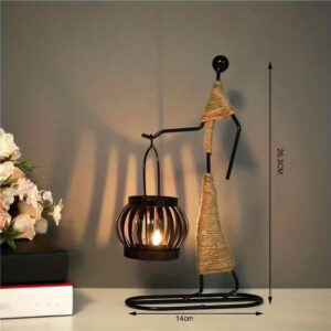 Portacandele in metallo - figura femminile